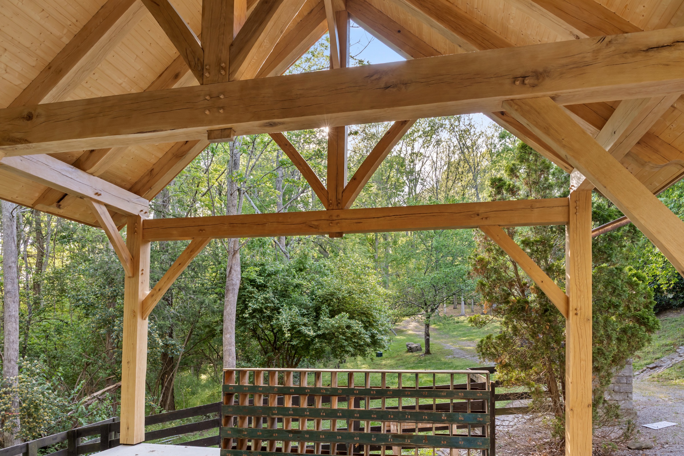 Open timber bay of the stone workshop with concrete floor